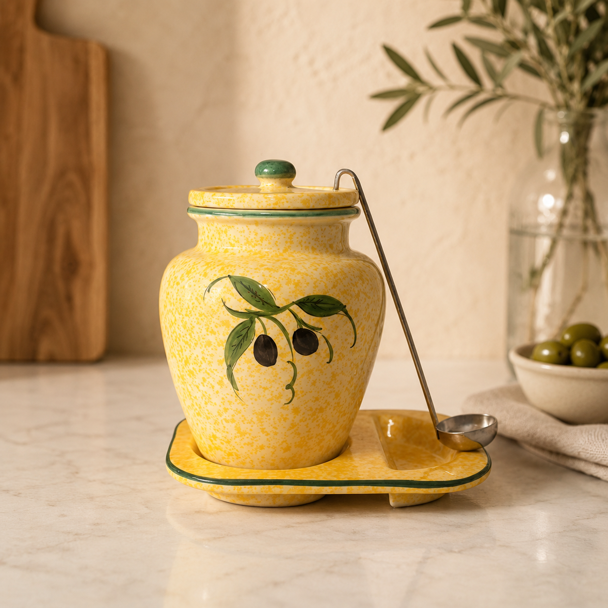 Hand-painted ceramic olive jar with matching tray and serving spoon, Mediterranean-style kitchen storage container with olive branch design