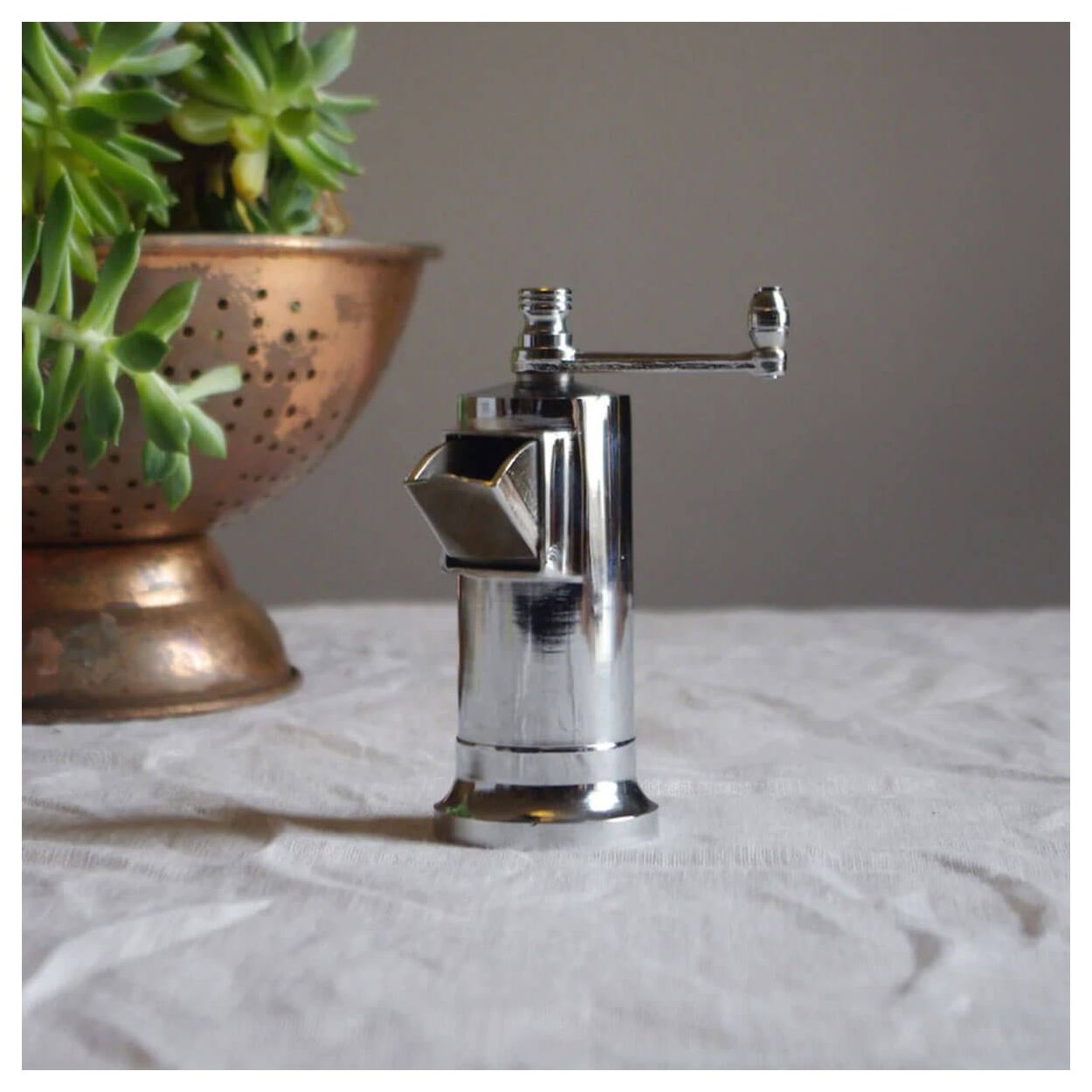 Peppermill Imports No.1 wholesaler handmade Chef’s Mate polished chrome spice grinder with ergonomic crank and durable metal body.