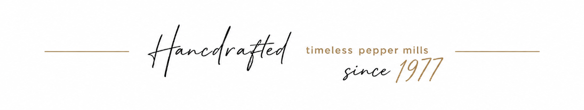 A minimalist brand graphic on a white background featuring the text 'Handcrafted' in black script, alongside 'timeless pepper mills since 1977' in brown and black serif typography.