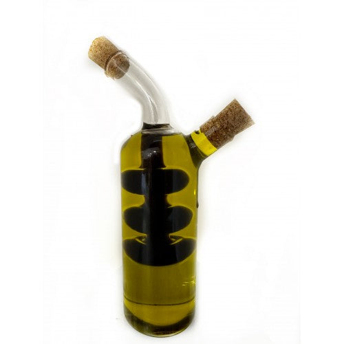 Glass smoking device with cork ends on a white background