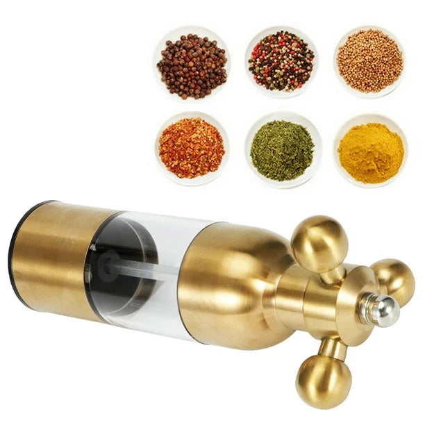 Gold stainless steel pepper mill with a clear acrylic chamber and ergonomic hand crank. Modern and stylish spice grinder for fresh seasoning, perfect for home kitchens and dining tables. Durable, easy-to-use manual pepper grinder with an adjustable grind setting for coarse or fine spices. Ideal for gourmet cooking, chefs, and food enthusiasts who love freshly ground pepper and salt. Sleek, elegant design adds a luxurious touch to any kitchen or restaurant.