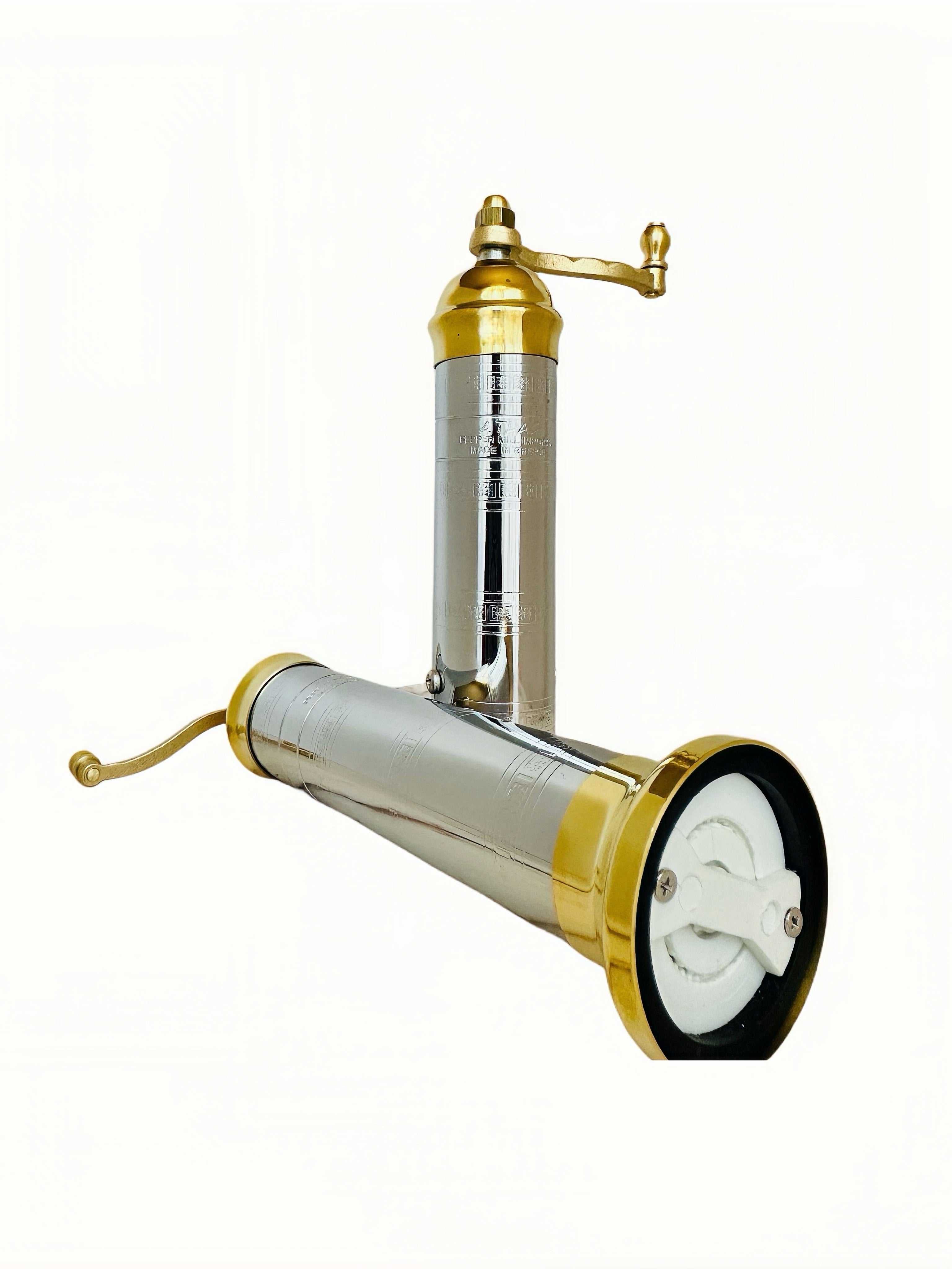 set of brass-chrome pepper salt grinders on a white background