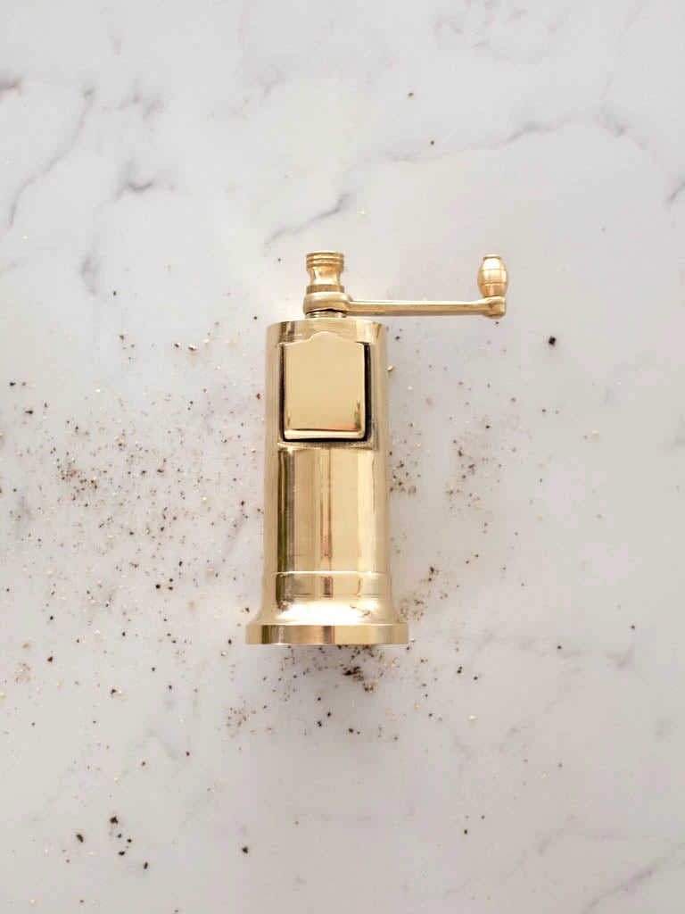 Premium Atlas Pepper Mill in polished brass finish, designed for consistent grind and durability—ideal for chefs and retailers.